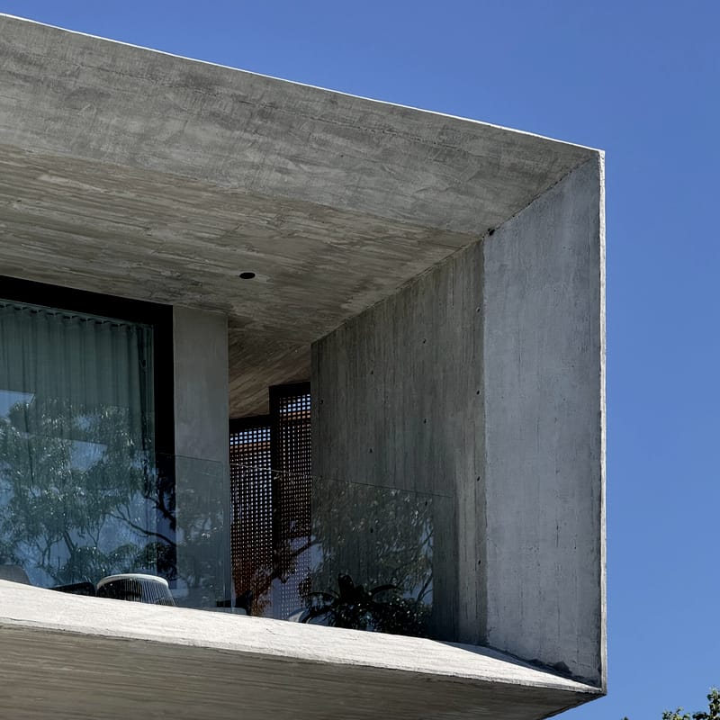 Close-up detail showing concrete and CANTILEVER, Castle Cove home