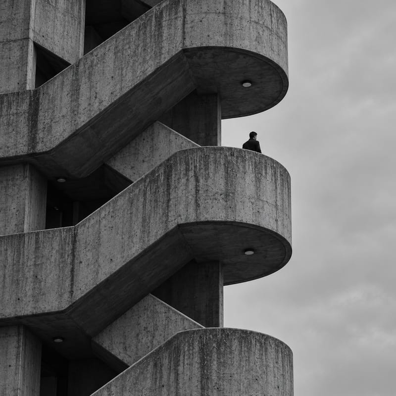 A solo man climbing a non-stop stair. Progressing, but at times lonely.